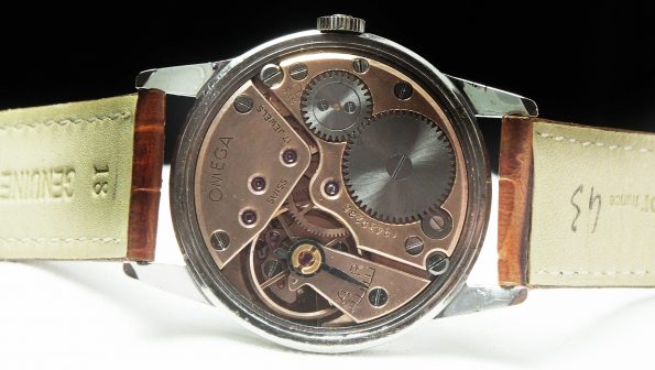 Perfekte Omega Vintage Uhr mit schwarzem Ziffernblatt