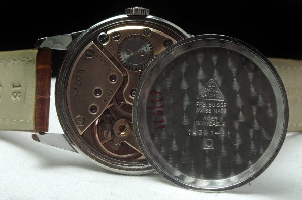 Perfekte Omega Vintage Uhr mit schwarzem Ziffernblatt