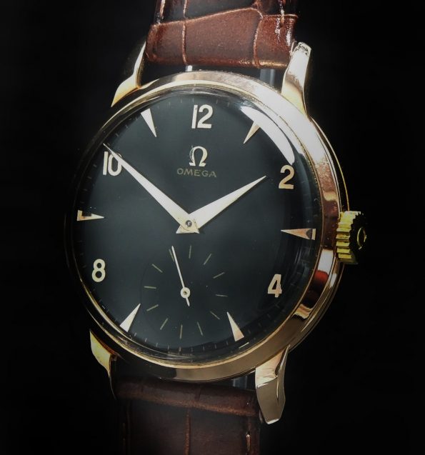 36mm Omega Vintage Uhr Rotgold mit schwarzem ZB