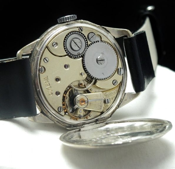 Outstanding 1930 Omega with 925 silver case and enamel dial