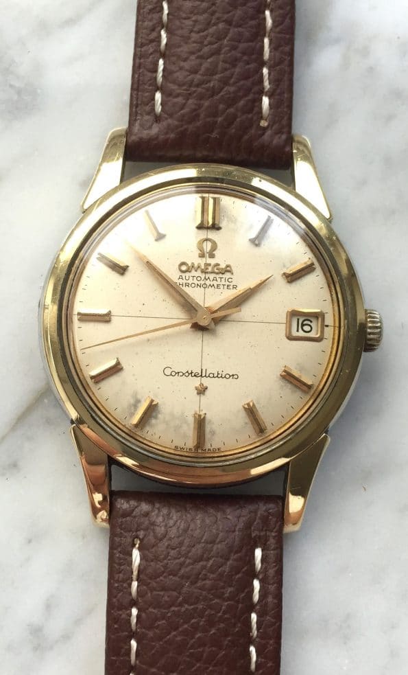 Used Omega Constellation with aged crosshair dial