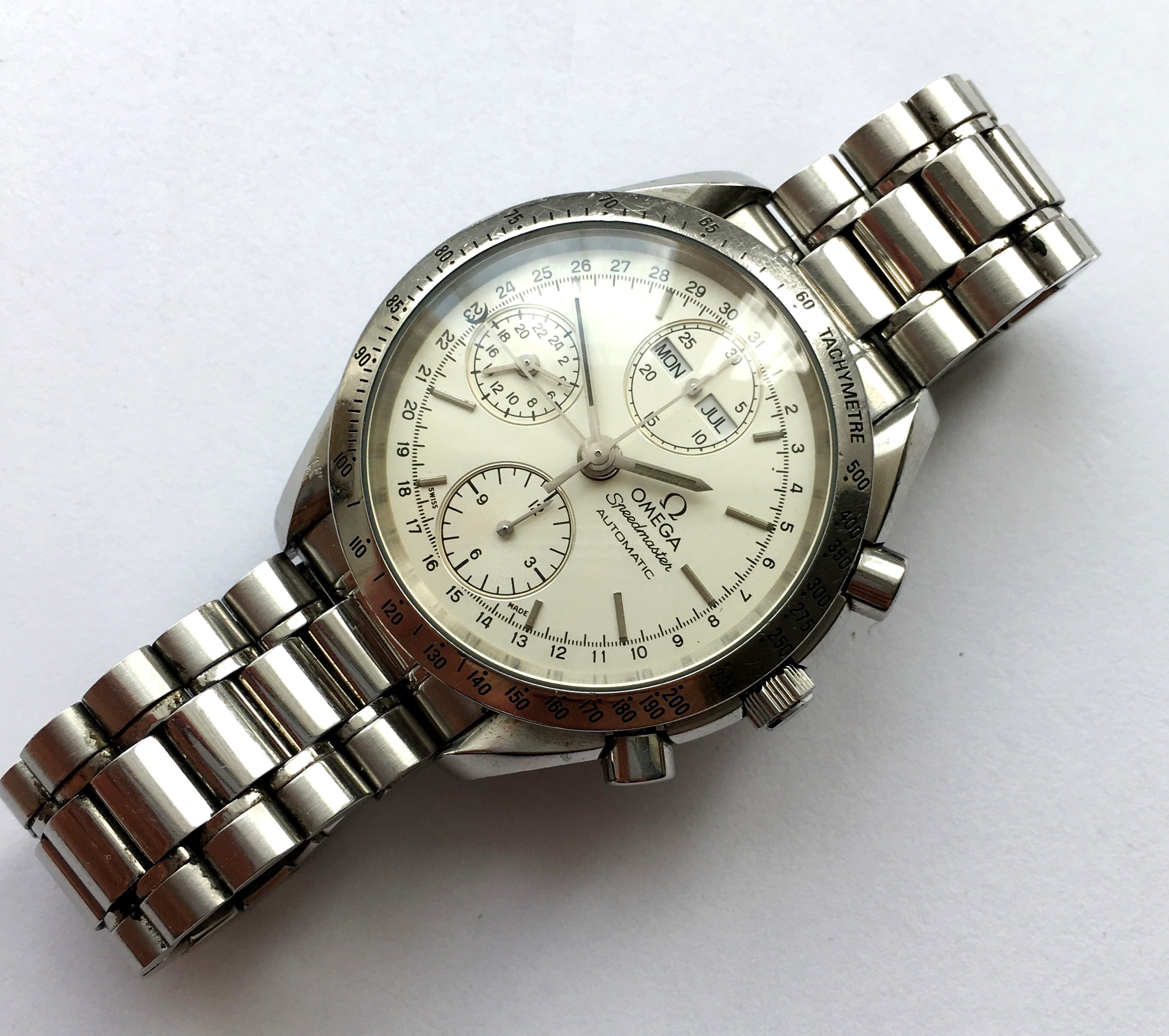 Omega Speedmaster Automatic Triple Date white dial ...