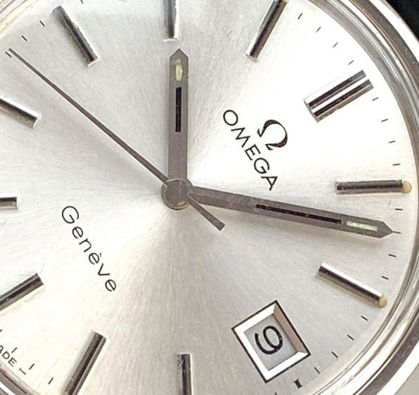 Vintage Omega Geneve Handwinding with unrestored silver sunburst tritium dial